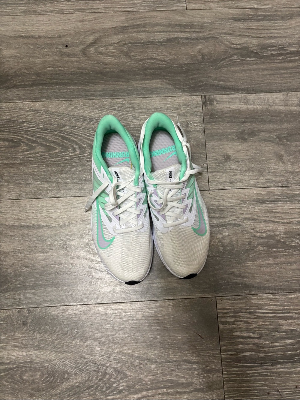 Nike Women's White Running Sneakers with Mint Accents